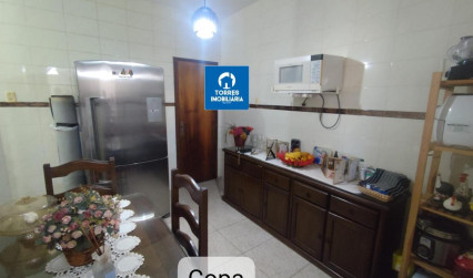 Imóvel com 2 quartos, terraço e vaga de garagem no Mutuá.